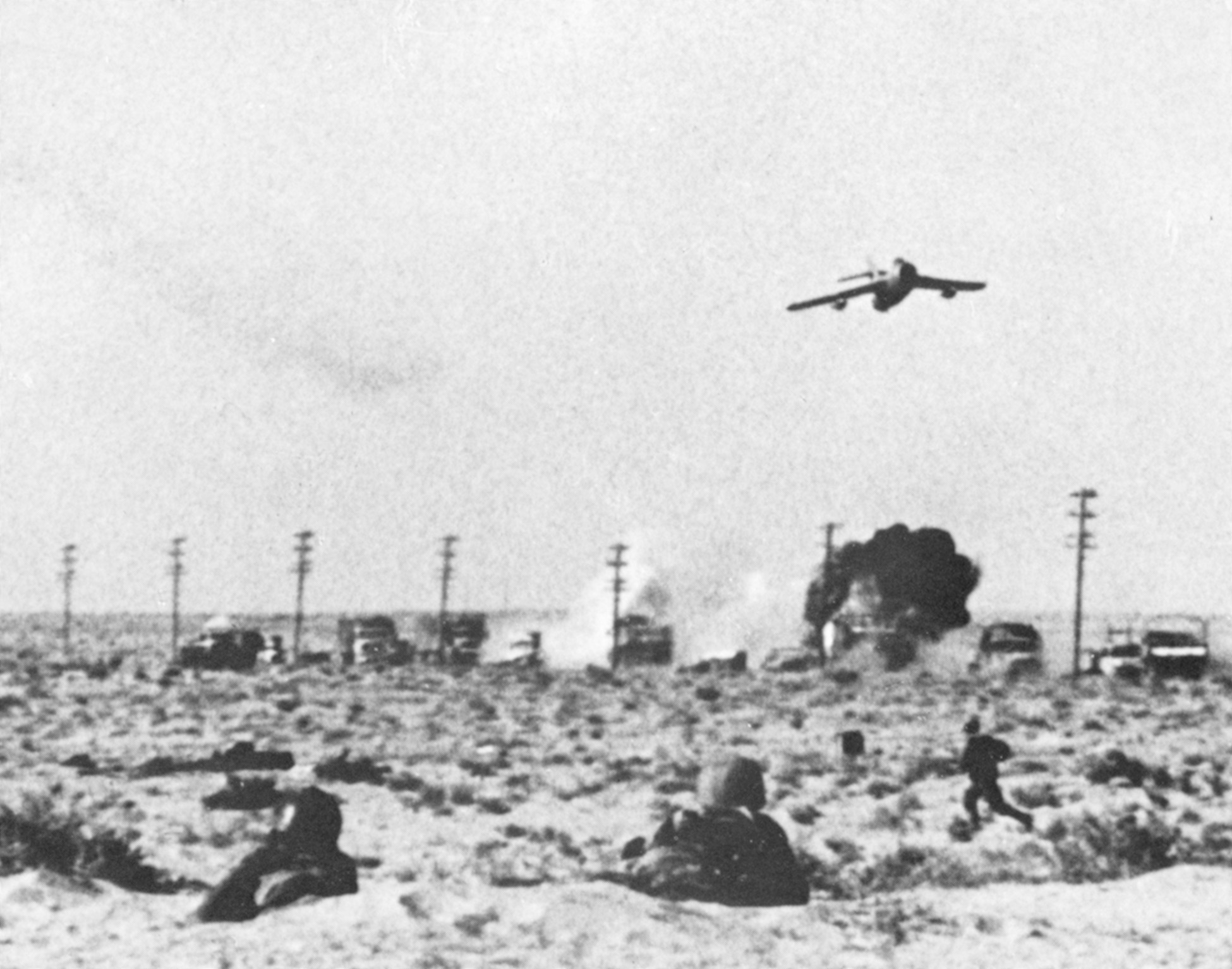 A MiG-17 sent from Algeria to Egypt after the preemptive strike bombs an Israeli column advancing toward the Suez Canal.