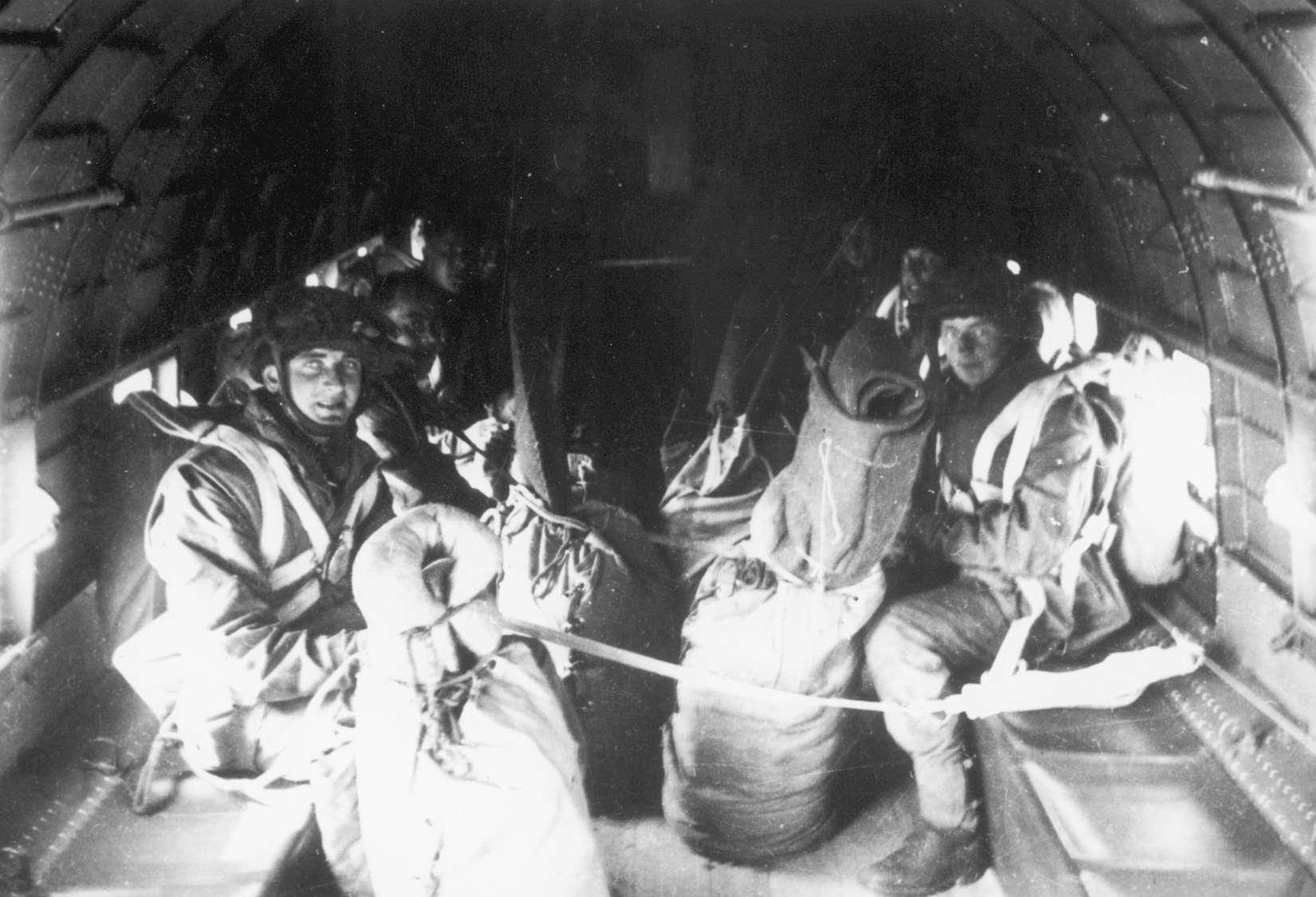 Paratroopers pose for a photo on the day of their airlift to the drop zones in Germany.