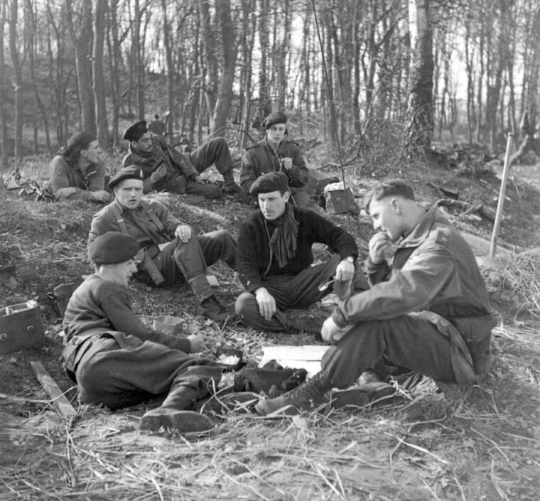 Canadians relax on the morning after the battle and prepare for further advance into Germany.
