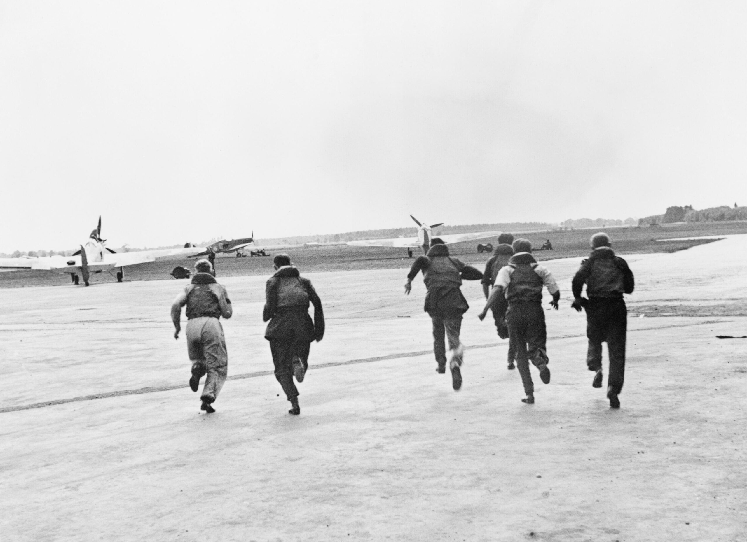 RAF Pilots run to their aircraft.