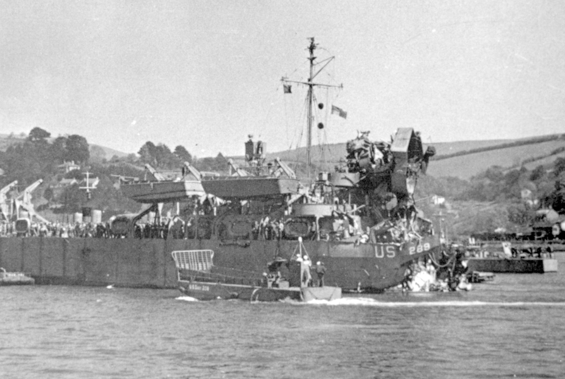After taking heavy damage from a German E-boat torpedo at Slapton Sands, LST-289 lies in a harbor at Dartmouth, England.