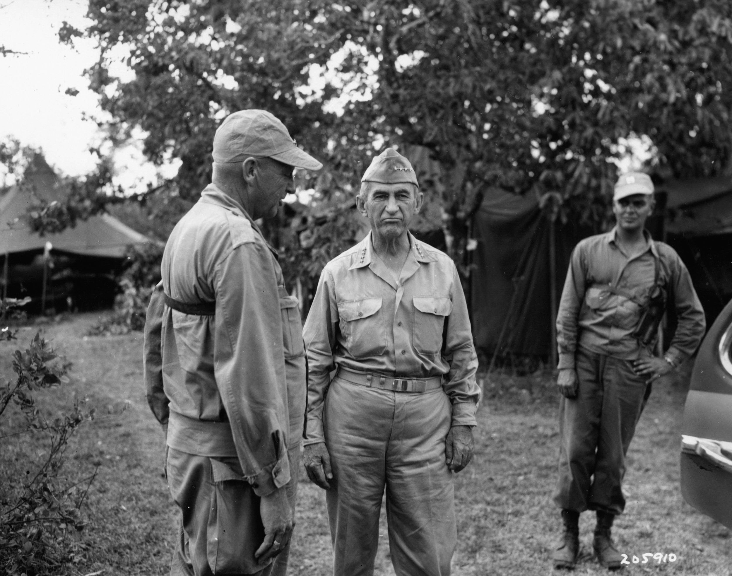Major General Leonard F. Wing, commander of the U.S. 43rd Division, confers with General Walter C. Krueger, commander of the Sixth Army.