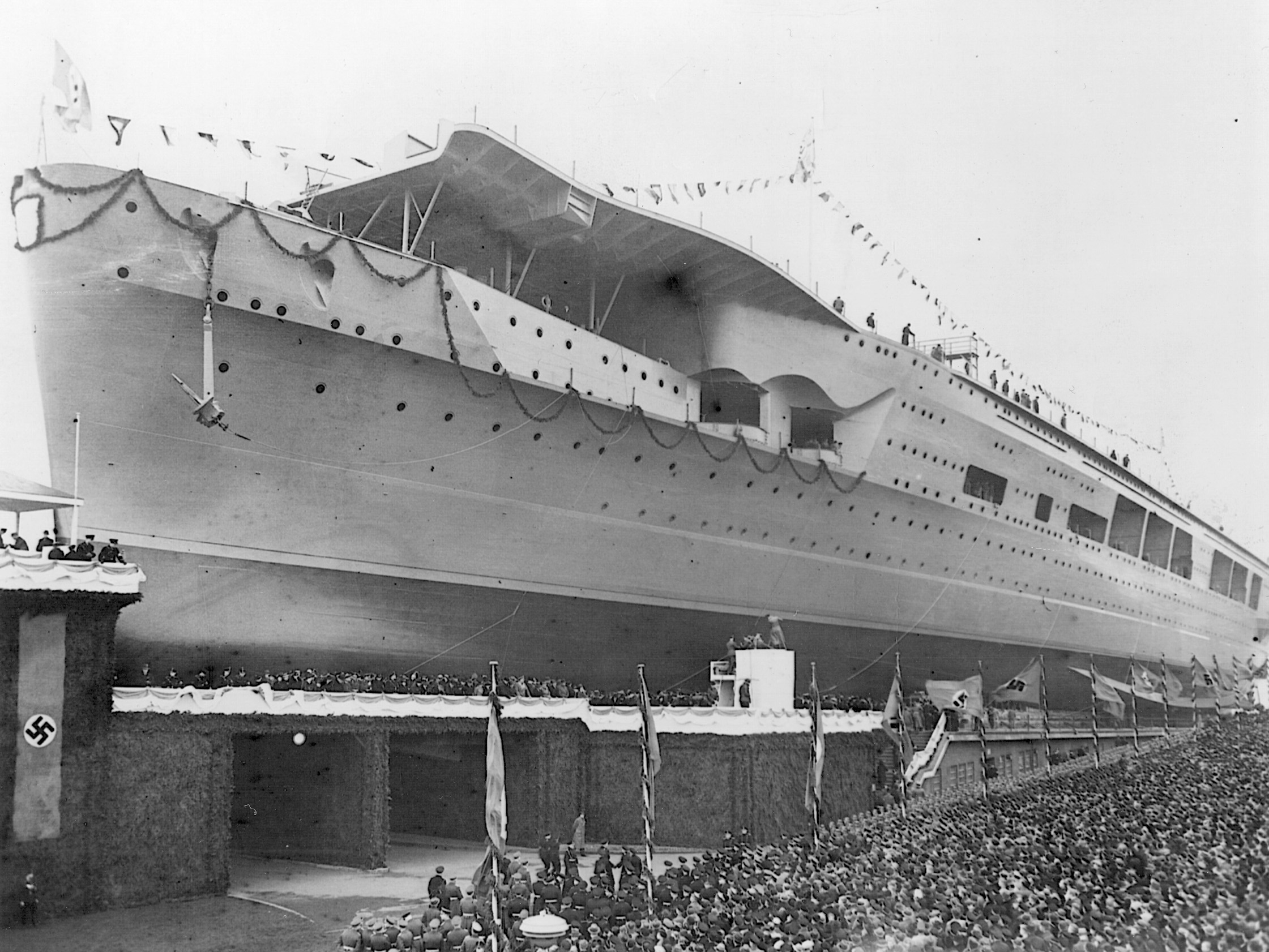 Crowds gather for the ceremony to launch aircraft carrier Graf Zeppelin at Kiel on December 8, 1938.