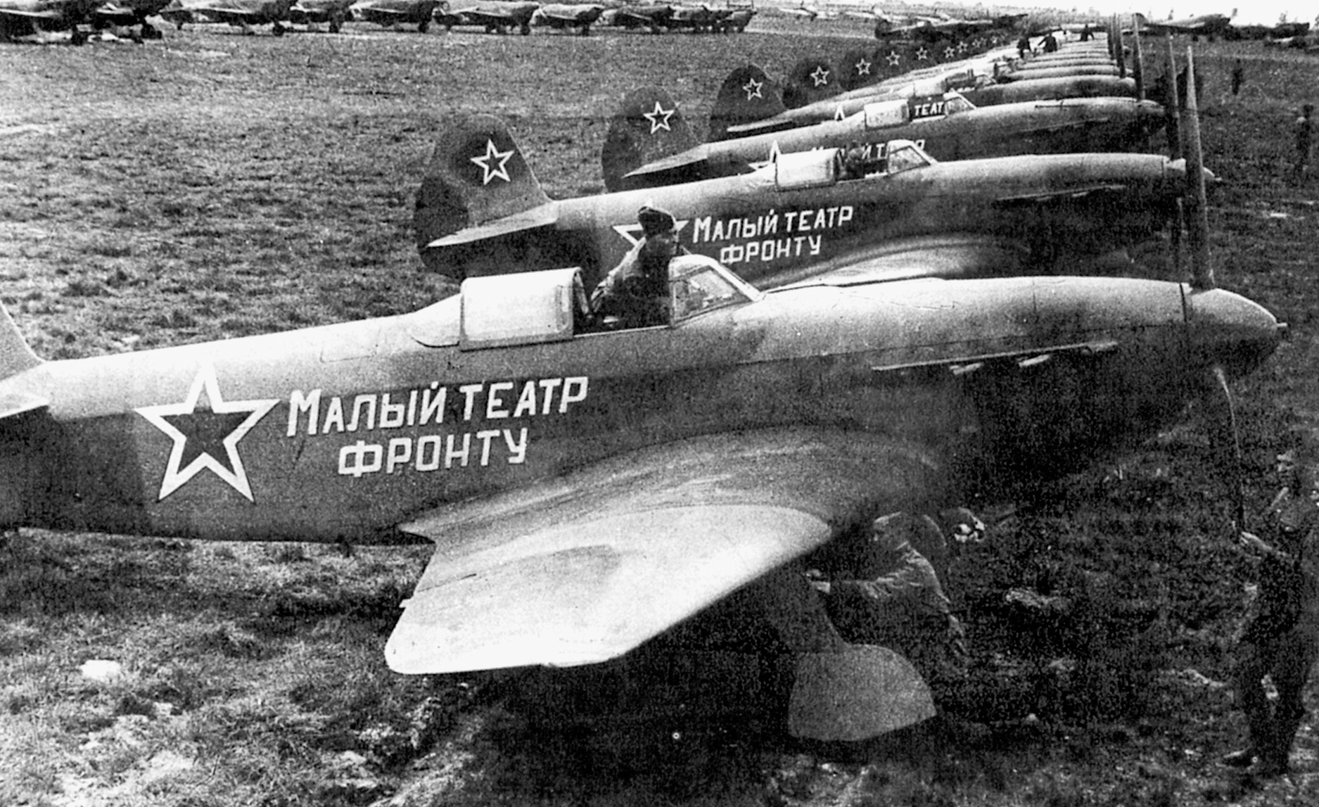Produced by the Yakovlev factory, rows of Soviet Yak-1 fighter planes line a field. Lilya Litvak’s prowess for flying Yak fighters earned her the nickname of the“Rose of Stalingrad.”