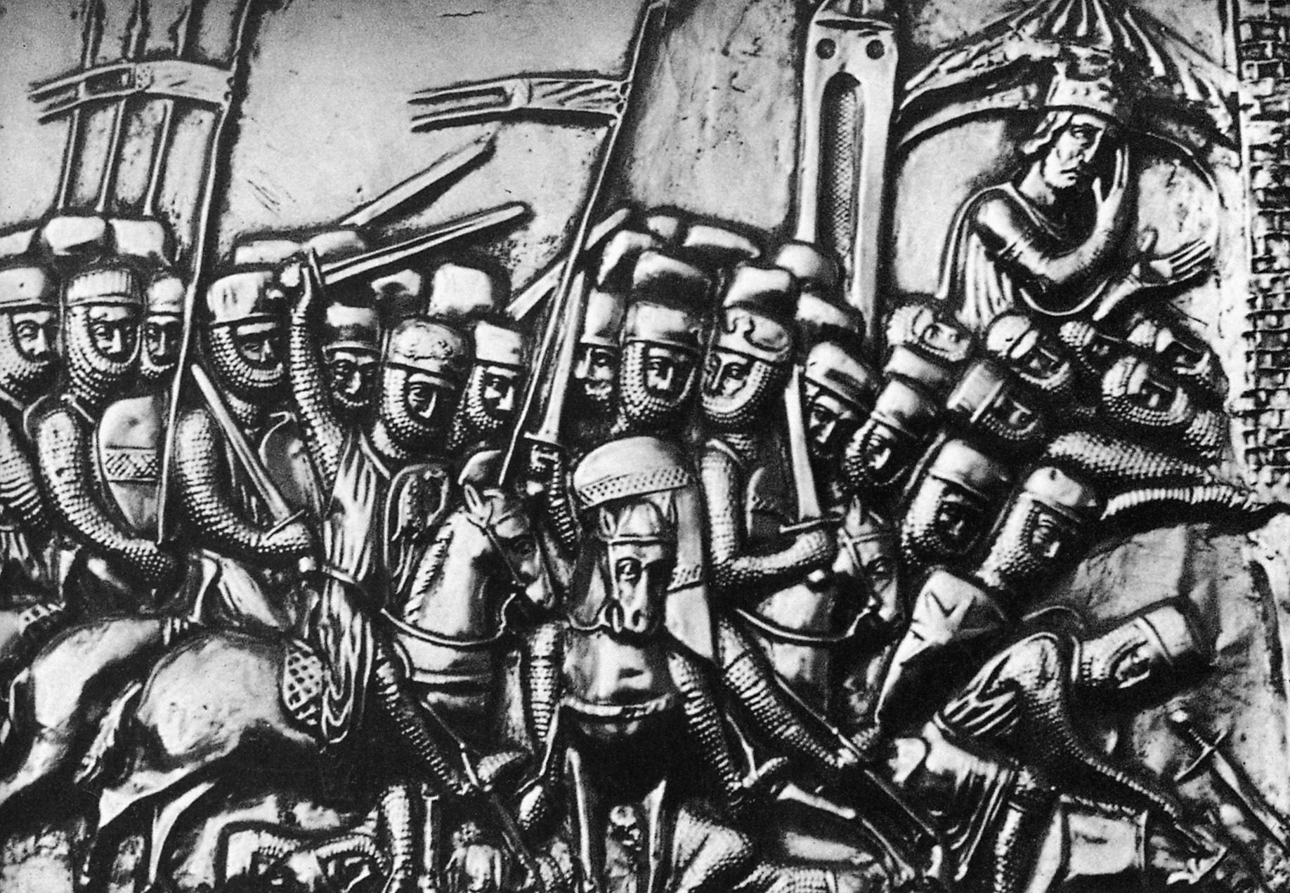 A 13th century metal casket depicts a force of heavily armored Teutonic Knights charging in full battle array.