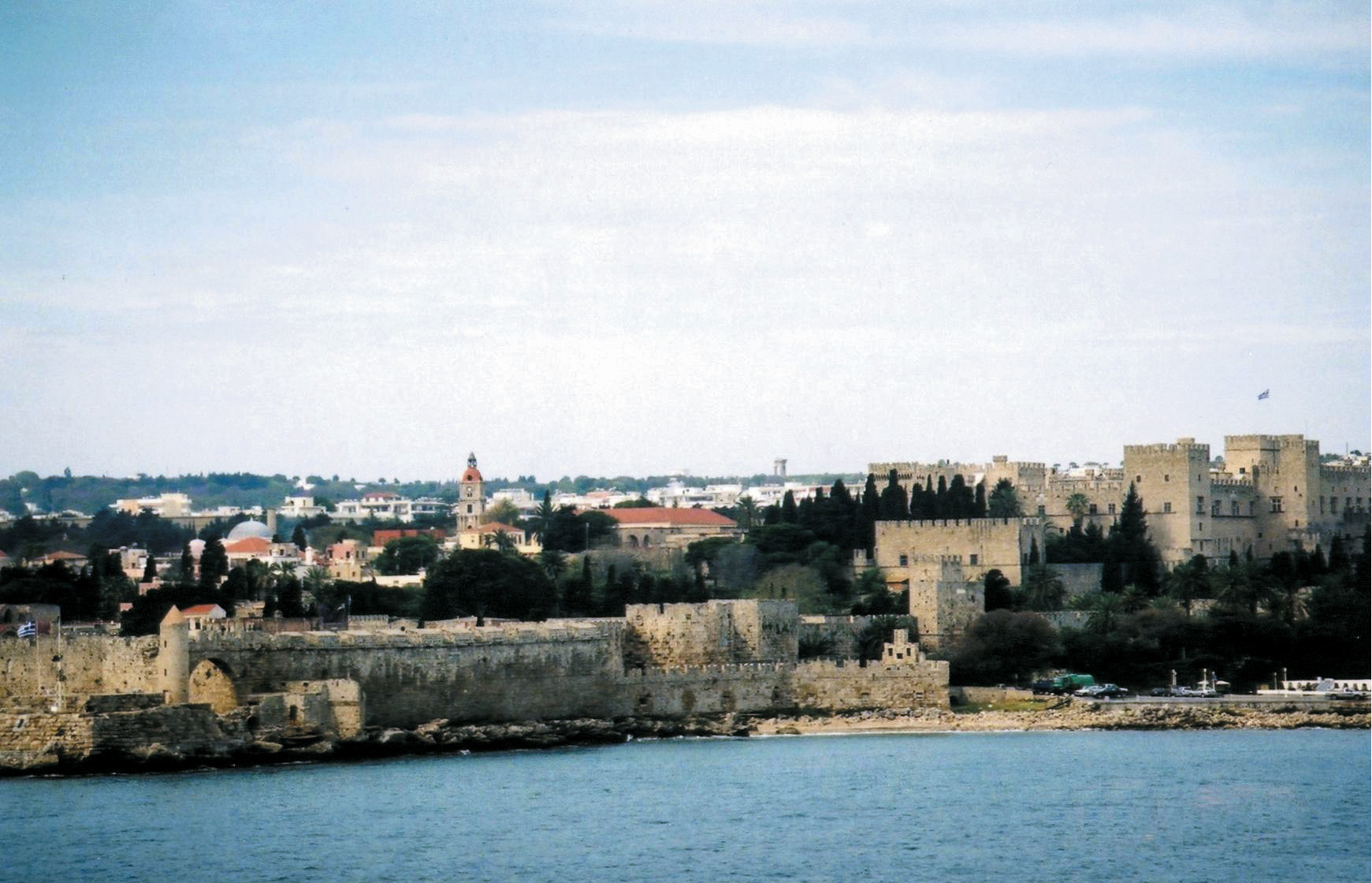 The formidible defenses of the Palace of the Grand Master at Rhodes Harbor are clearly visible in this modern-day photograph.