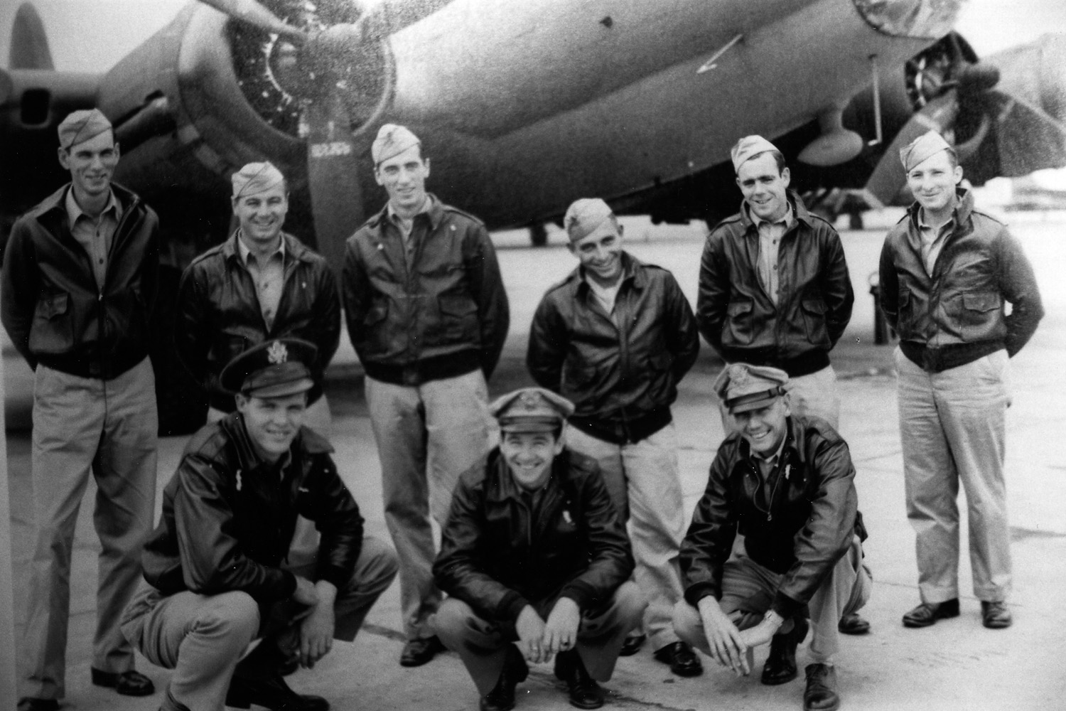 Ralph Patton is seen (front row, center) with his B-17 bomber crew. Patton was one of many downed airmen who were assisted by French patriots to avoid capture.
