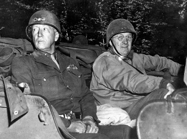 Lt. Gen. George S. Patton and Maj. Manton Eddy pause for a photo in France.