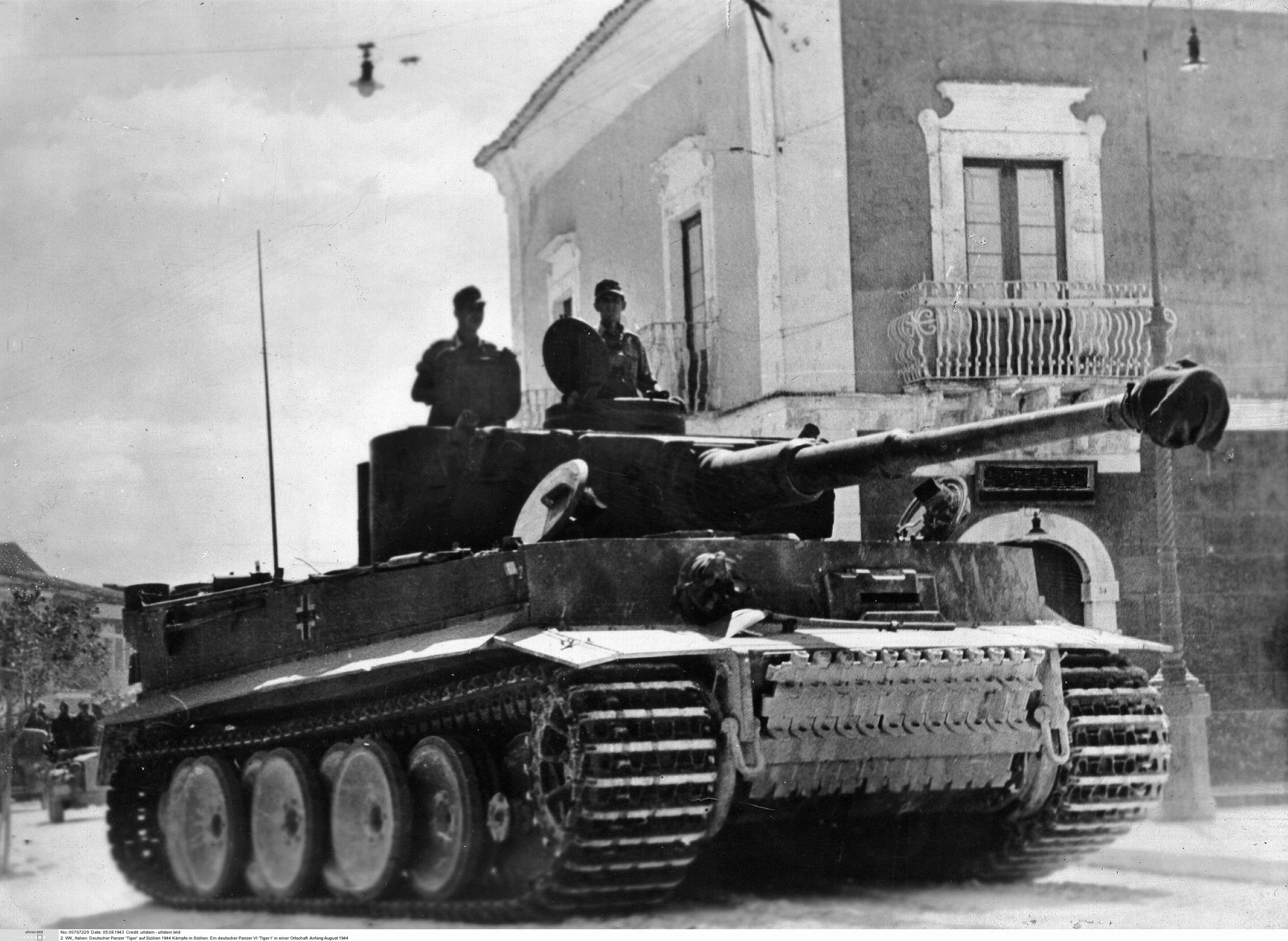 A German Mark VI Tiger patrols the streets of a Sicilian village for signs of advancing Allied columns.