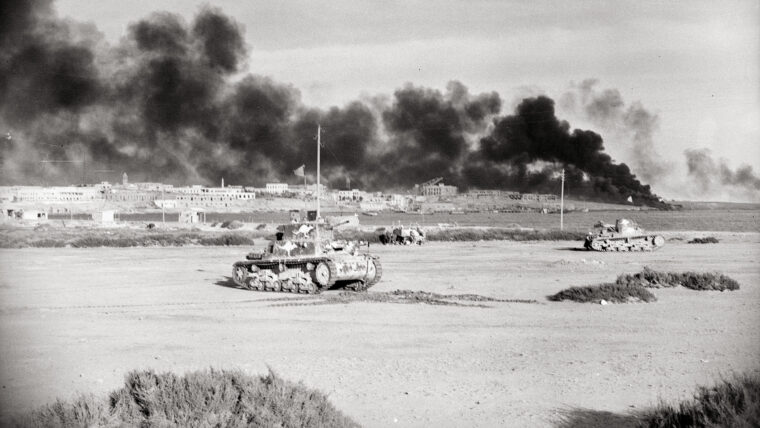 Embattled Tobruk lies under a pall of smoke during Rommel’s push to capture the vital North African port city in the spring of 1941.