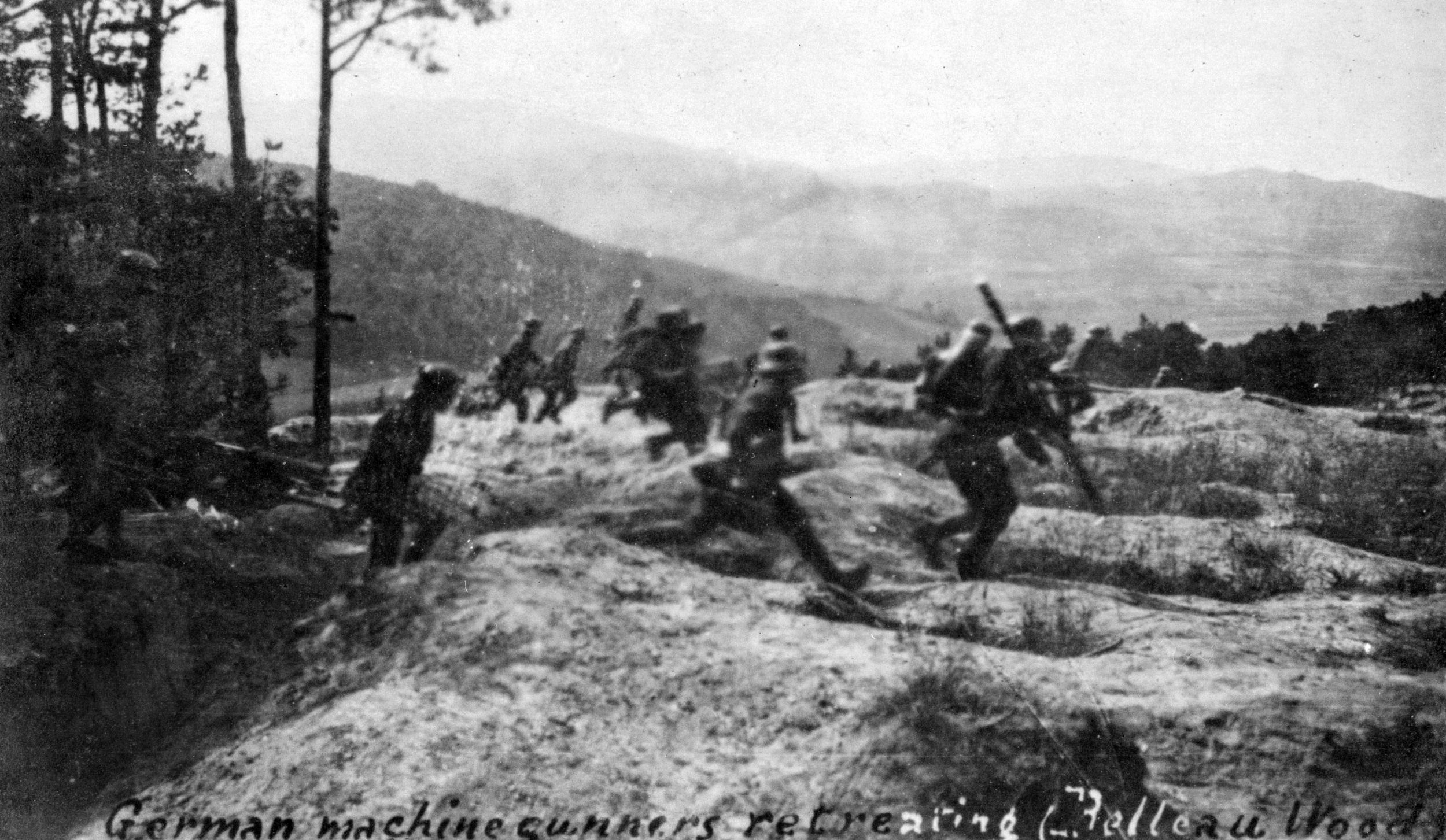 German machine gunners in full flight from American troops at Belleau Wood.