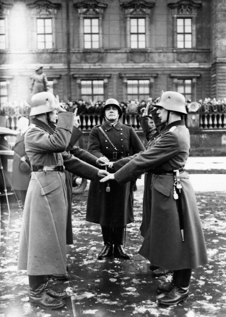 A German soldier takes an oath to Adolph Hitler—not the German nation—during World War II. Every male between 18 and 45 was subject to call-up.
