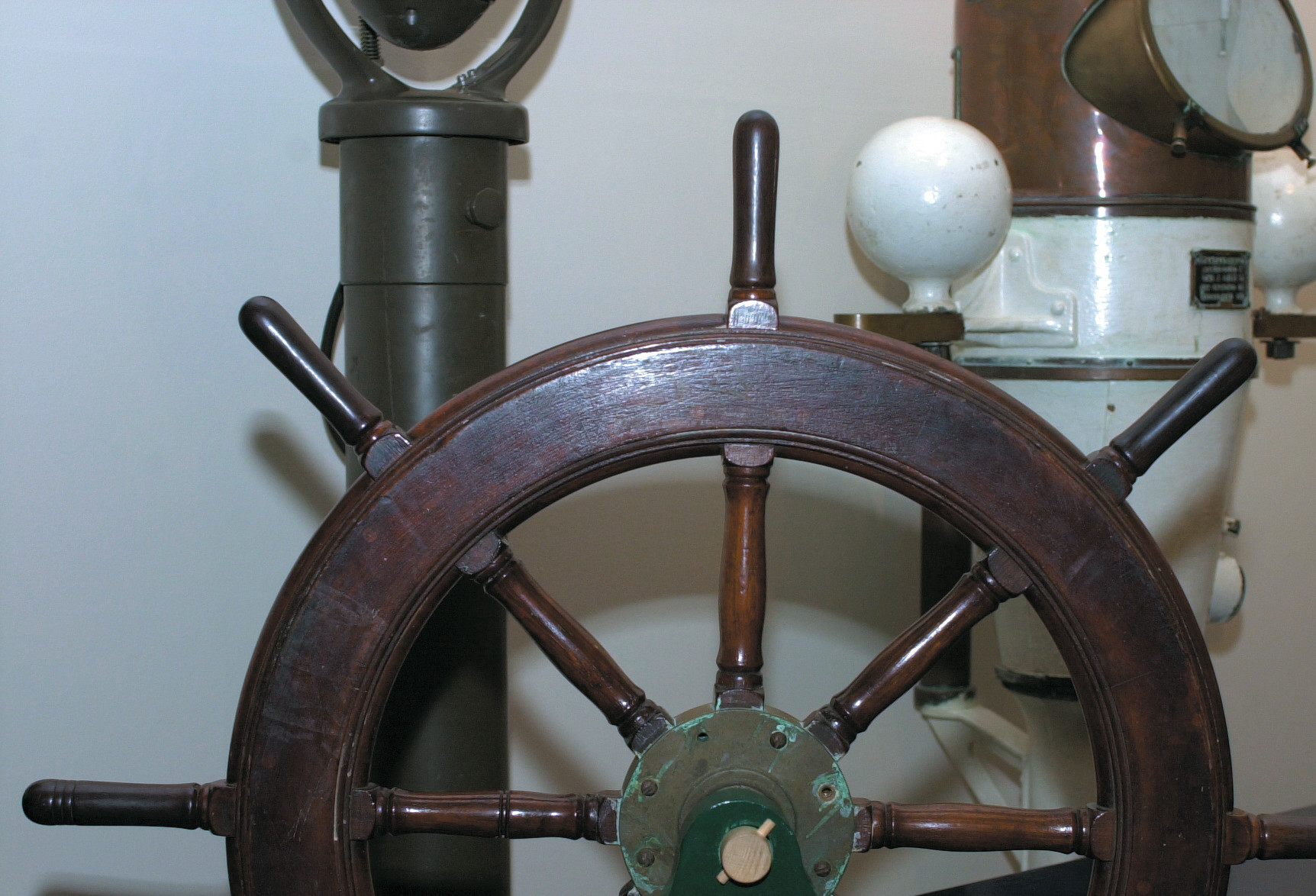 The collection also contains ship’s wheels from various cutters.