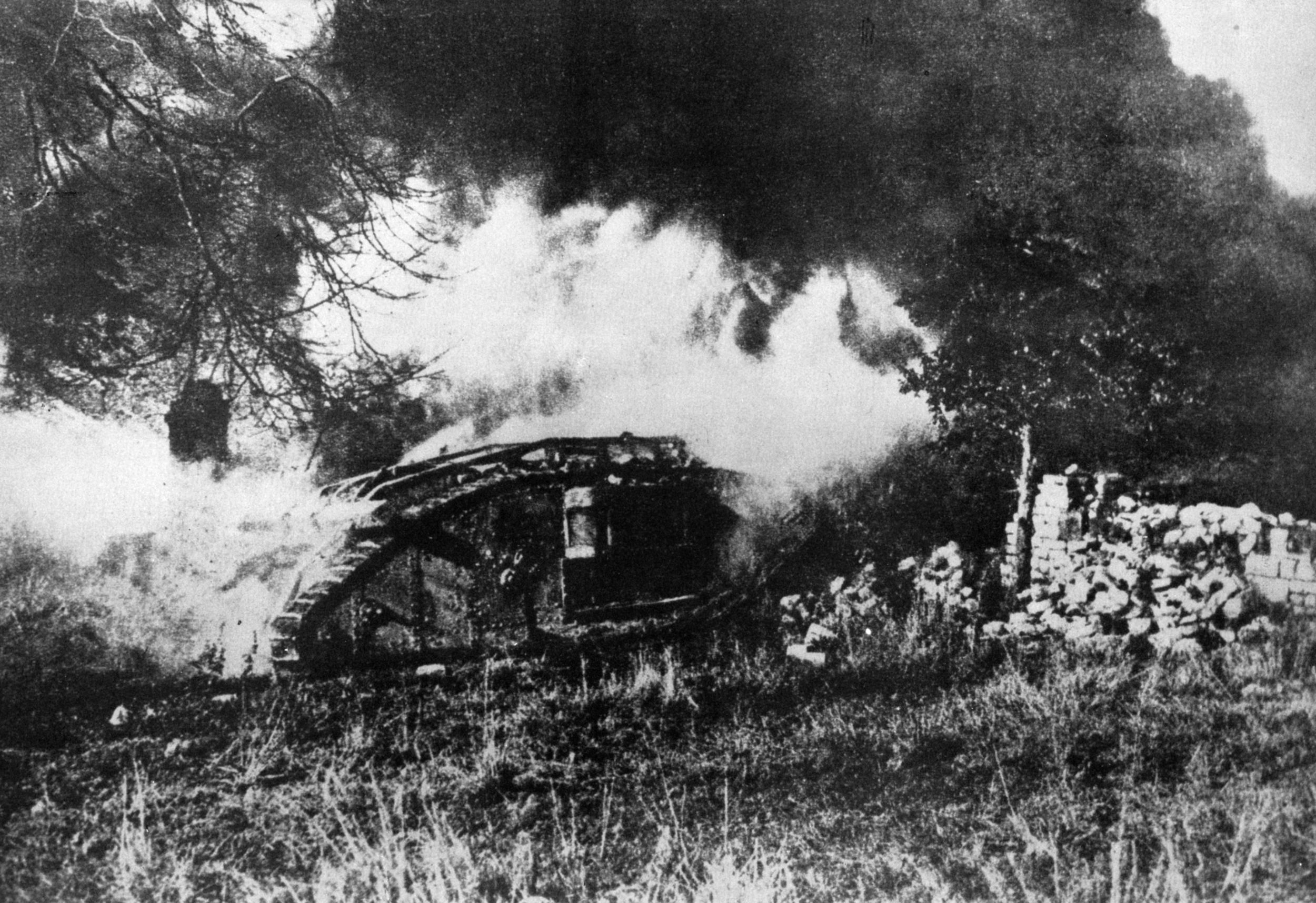 A British tank engulfed in flames during World War I.