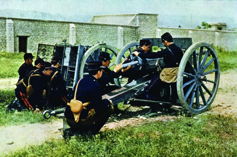 French artillerymen efficiently handle a 75mm cannon and caisson at the First Battle of the Marne, September 1914. French artillery was key to holding off the rampaging German Army and keeping it out of Paris.