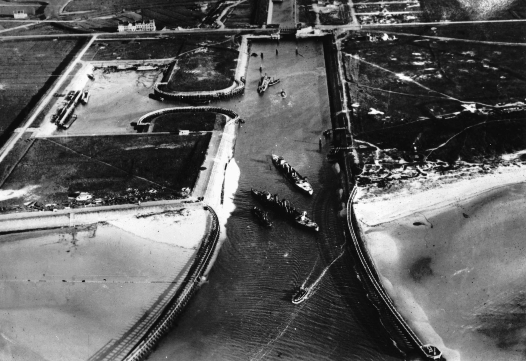 A German aerial photograph shows the damage inflicted on the Belgian port of Zeebrugge following the historic Allied raid. 