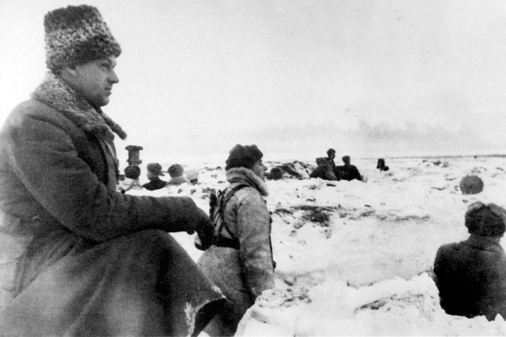 Commander of the Soviet Don Front, General Konstantin Rokossovsky observes units moving forward to attack German positions around the embattled city of Stalingrad.