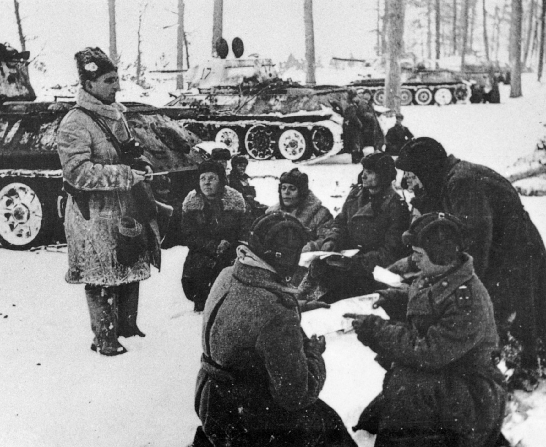 Soviet tank commanders are briefed by a commanding officer. The quality of the Soviet T-34 tank was a major factor in the ultimate victory of the Red Army.