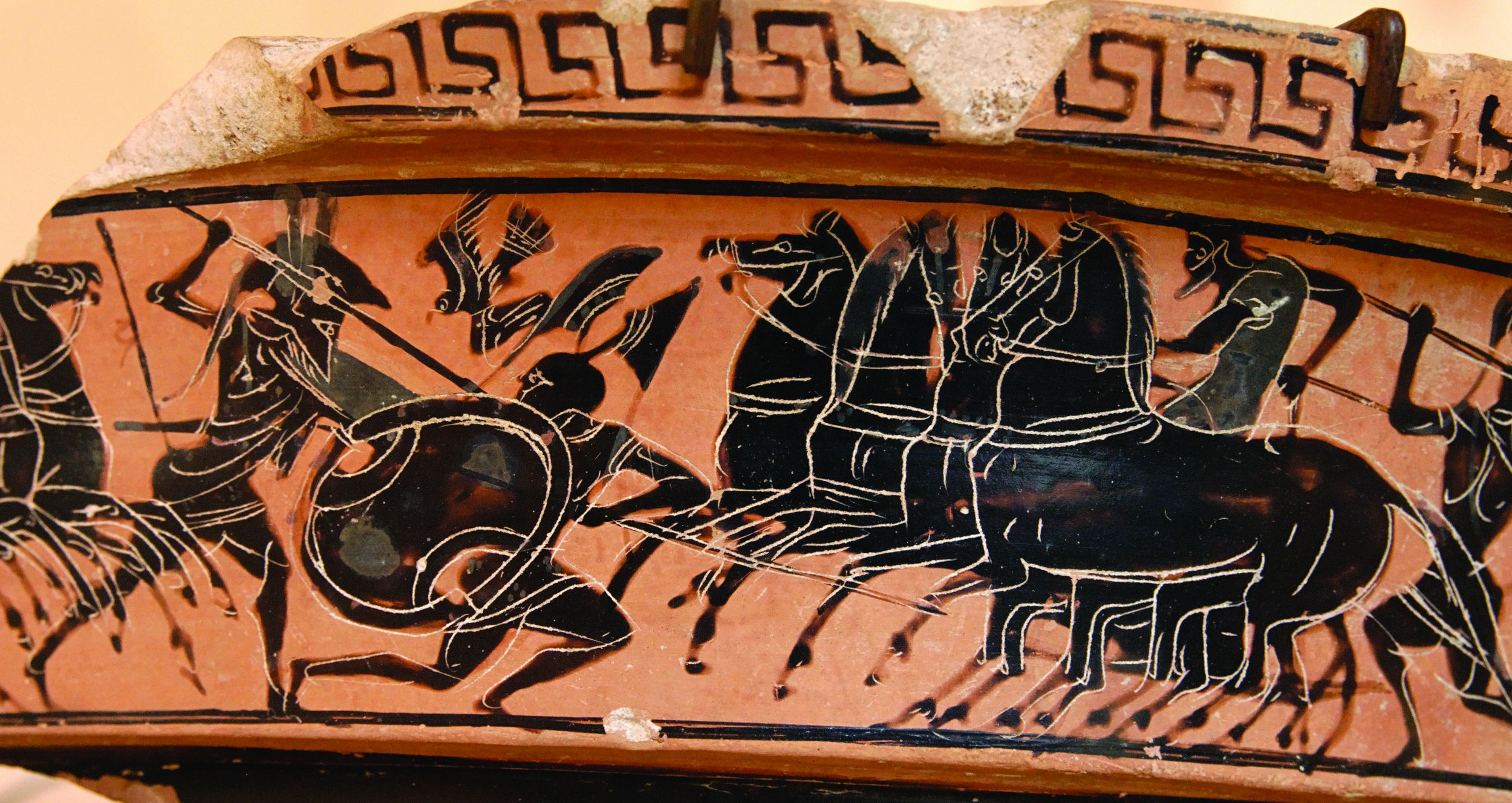 Hoplite spearmen confront cavalry forces in this fragment of an Attic scroll, circa 510 bc.