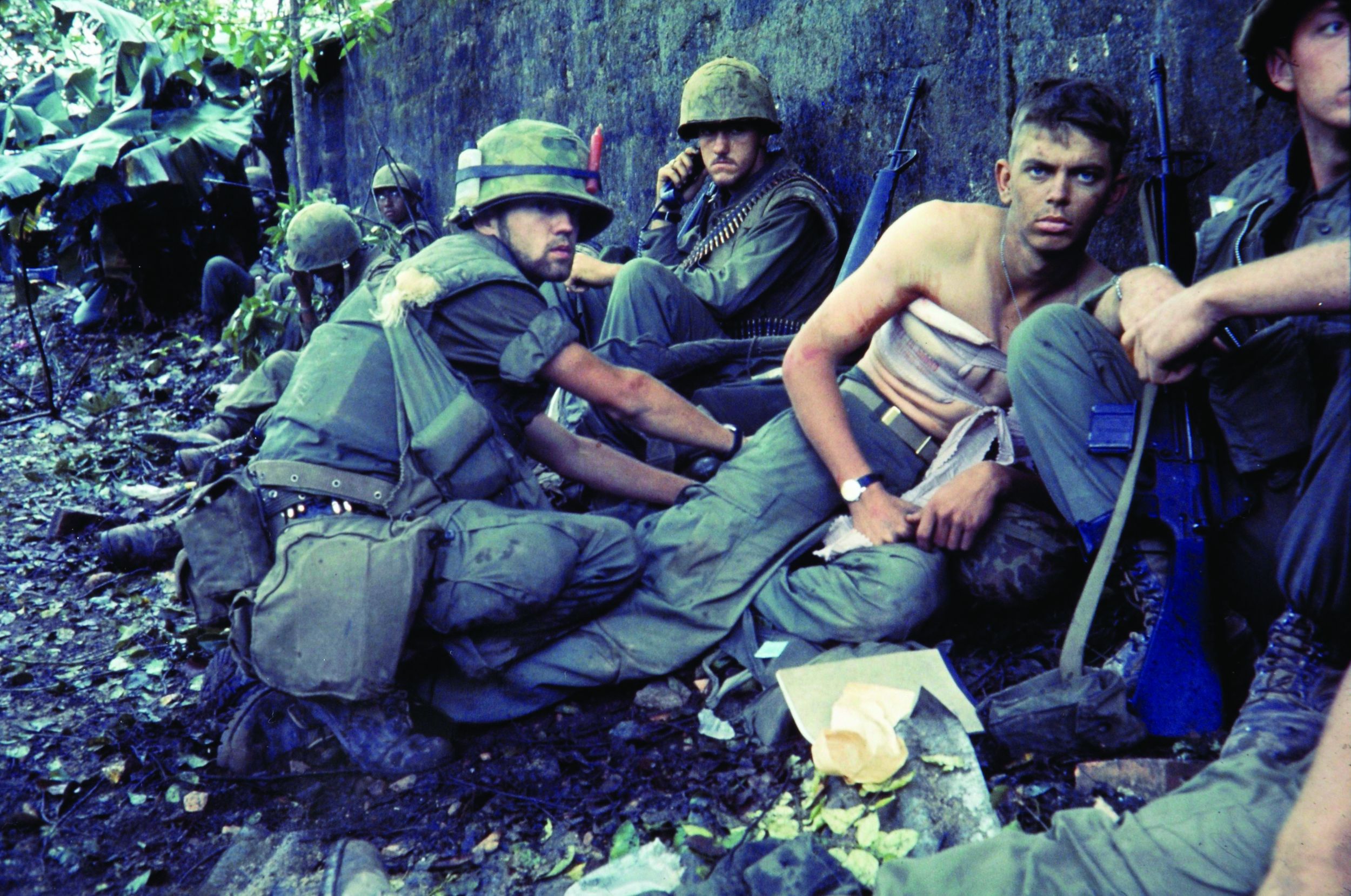 A Navy corpsman tends to a wounded Marine of 2nd Battalion, 5th Marine Regiment. The Marines suffered nearly 1,000 casualties during the battle.