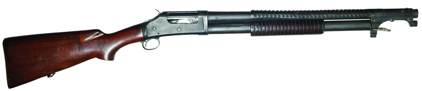 A Winchester 12-gauge shotgun.