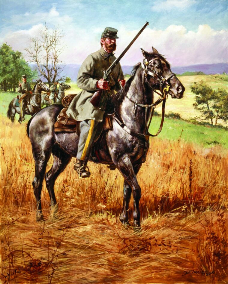 A member of the famed 4th Virginia Cavalry, Black Horse Troop, has his shotgun at the ready.