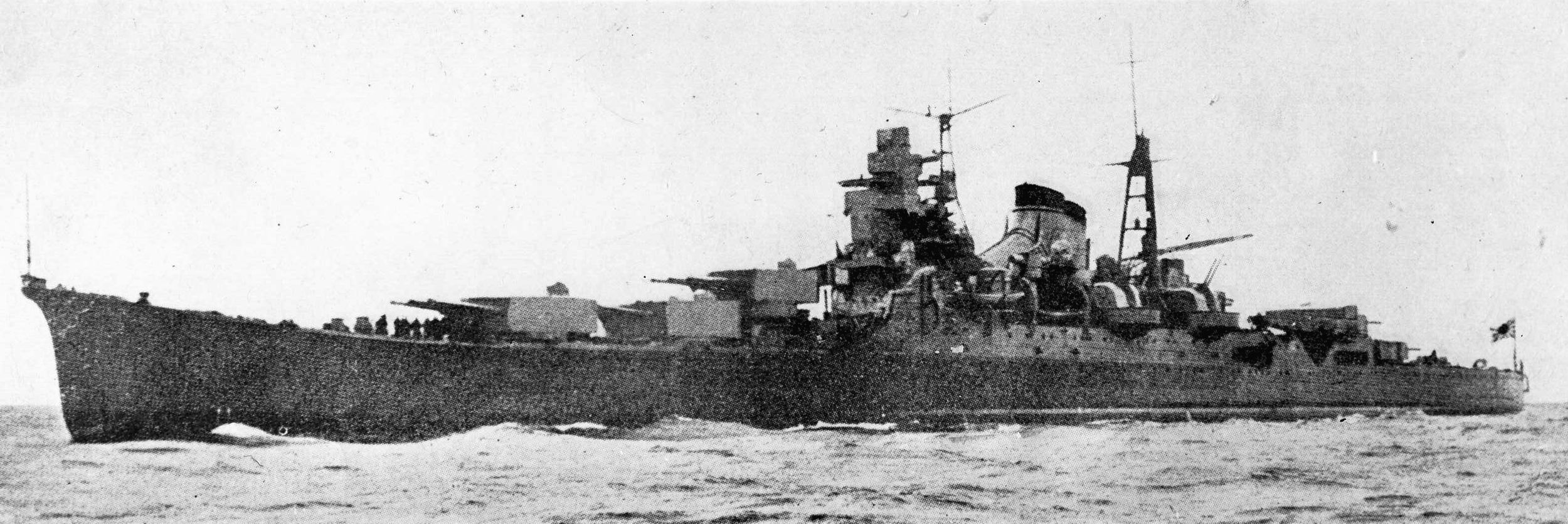 The Japanese cruiser Kumano is shown underway in the Pacific. Its sister, Mogami, and its crew of 850 were put out of action off the coast of Java. 