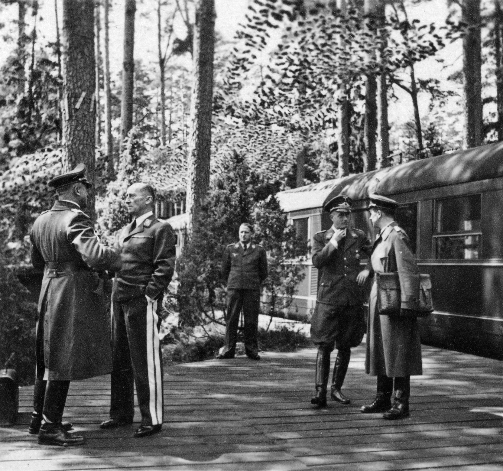 Couriers meet beside the train that served as Göring’s mobile command headquarters.