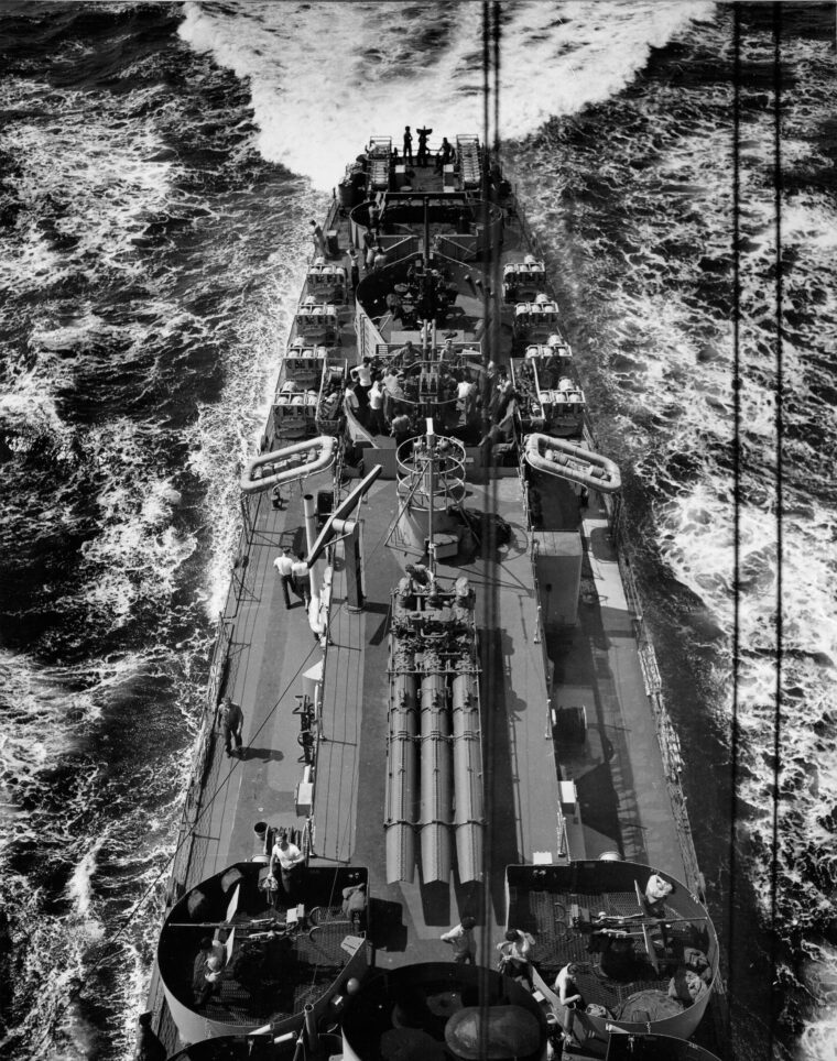 This photograph of the stern of the destroyer escort USS Menges shows the 21-inch torpedo battery that originally equipped such warships starting with the Buckley class. Also note the 20mm and 40mm antiaircraft mounts, the 3-inch deck gun, depth charge throwers, and racks.
