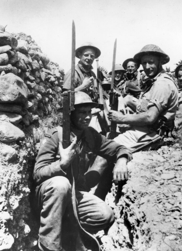 This early in the war, British soldiers still carried sword bayonets of the pre-WWI pattern. The older weapons proved invaluable for hand-to-hand fighting in Crete.
