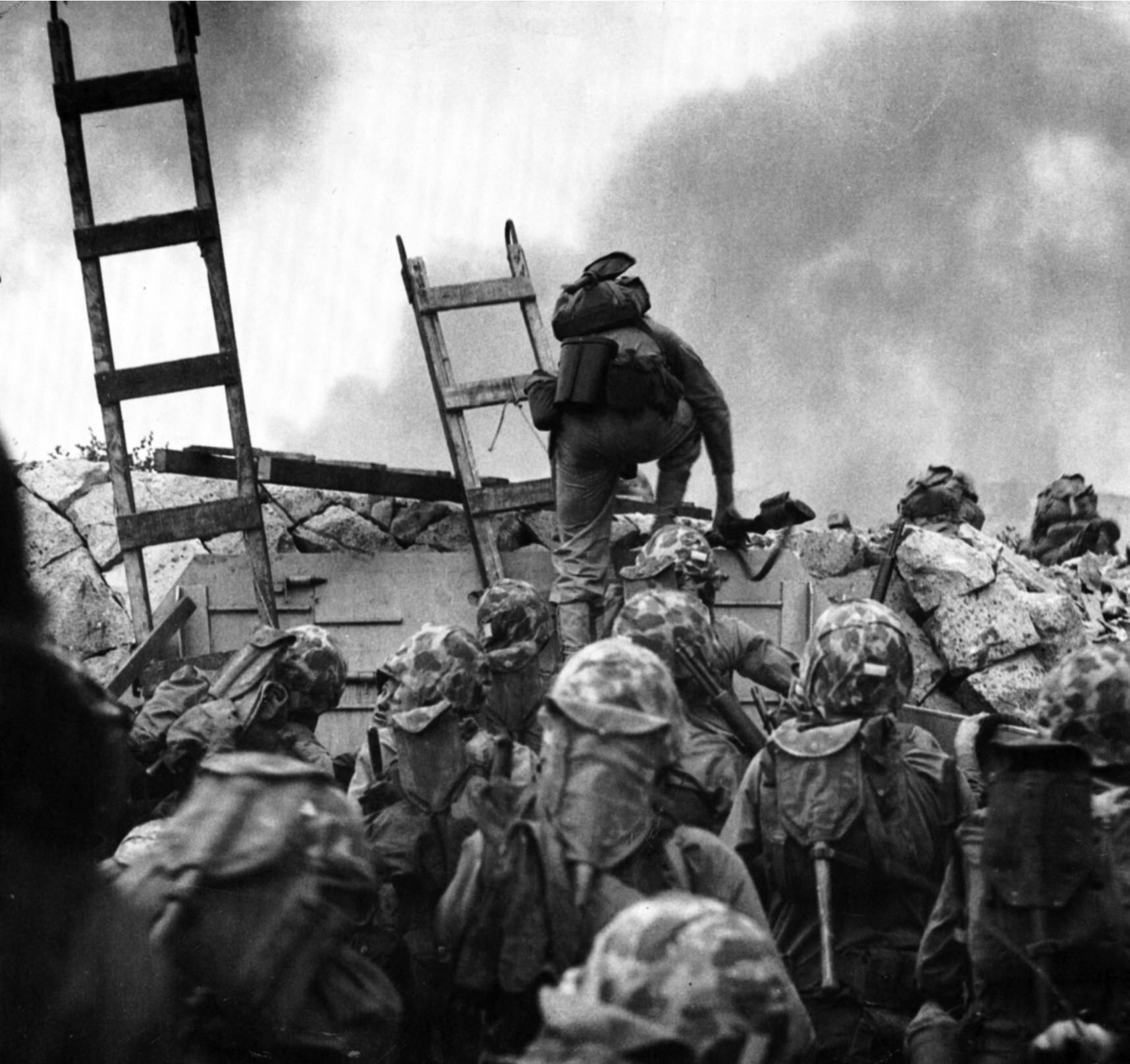 First Lieutenant Baldomero Lopez leads U.S. Marines over the seawall at Red Beach during the audacious landing at Inchon on September 15, 1950. Lopez was awarded a posthumous Medal of Honor for throwing his body on a grenade to shield his men.