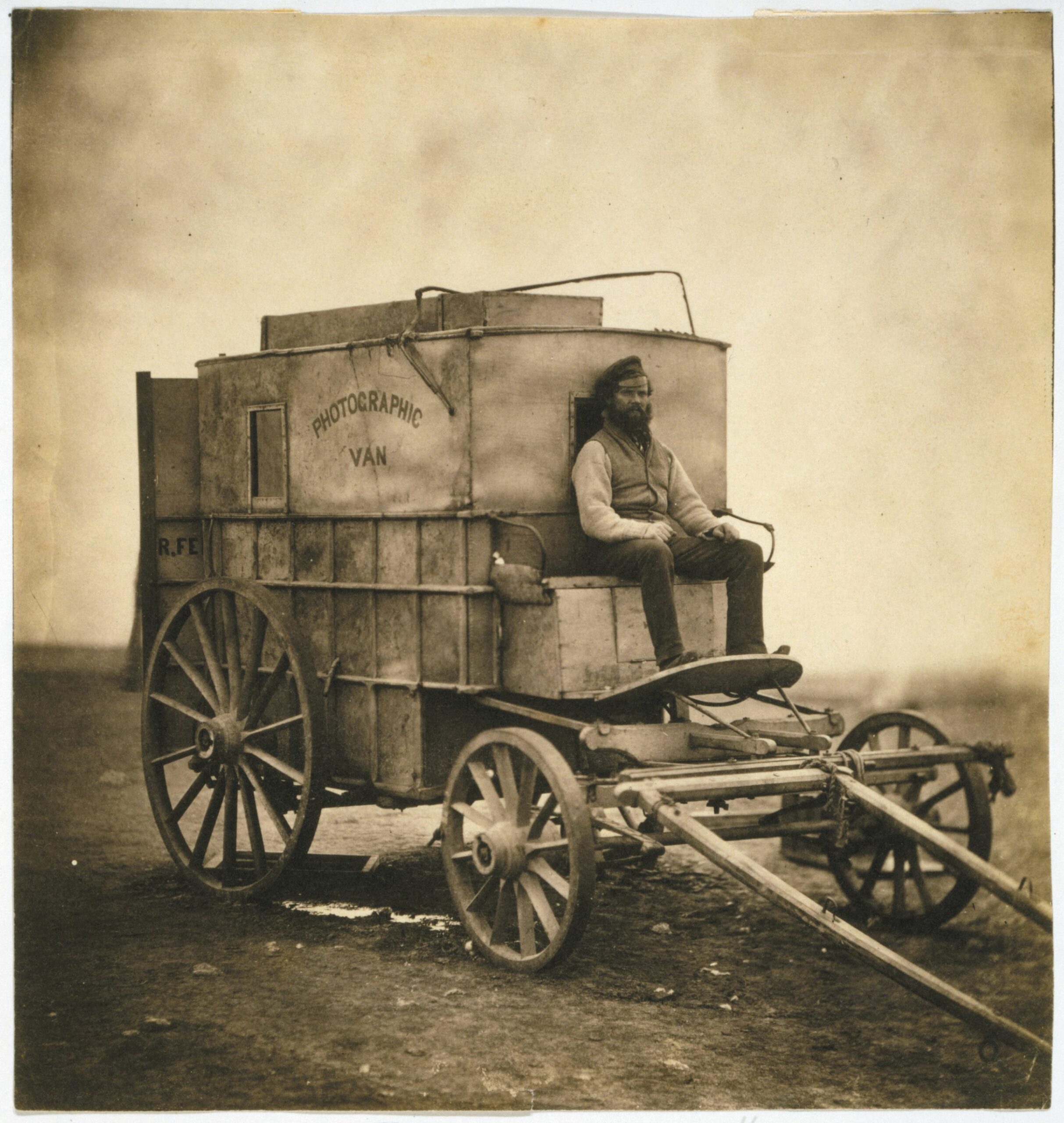 Roger Fenton, photographed with the wagon that carried his photographic equipment.