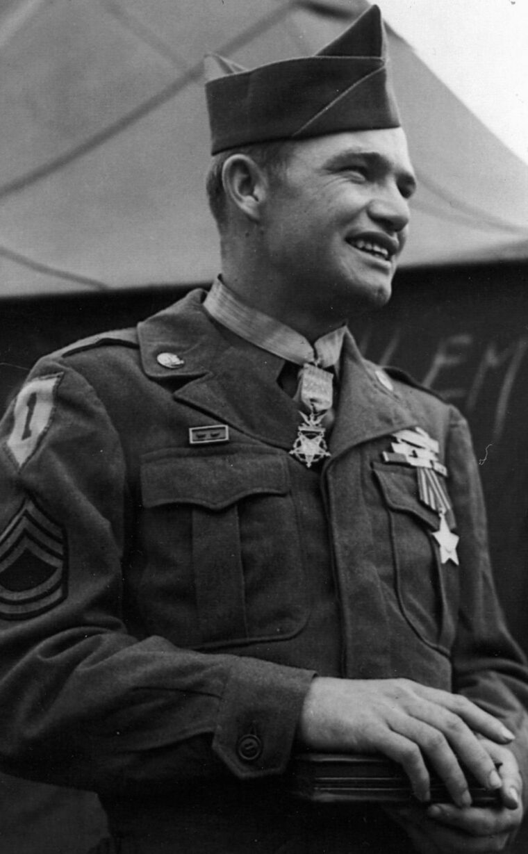 Sergeant Max Thompson of Company K, 18th Regiment, 1st Infantry Division earned the Medal of Honor while fighting on the outskirts of Aachen. Using several different weapons, he took on German troops and helped his unit advance. (Both: National Archives)