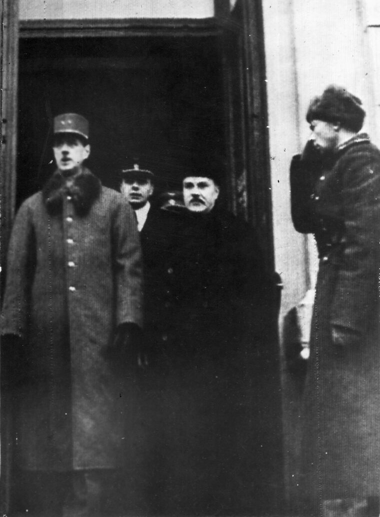 En route to a meeting with Soviet Premier Josef Stalin, French leader Charles de Gaulle stands at the entrance to the railway station in Moscow on December 1, 1944.  Accompanying de Gaulle is Soviet Foreign Minister Vyacheslav Molotov (right).