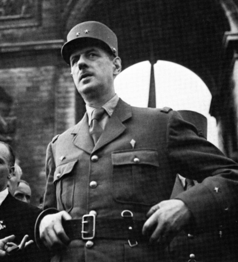 General Charles de Gaulle, leader of the Free French, meets with Georges Bidault, a commander of the French Resistance, in front of the Arc de Triomphe in Paris.  The date is August 26, 1944, following the liberation of the City of Light.