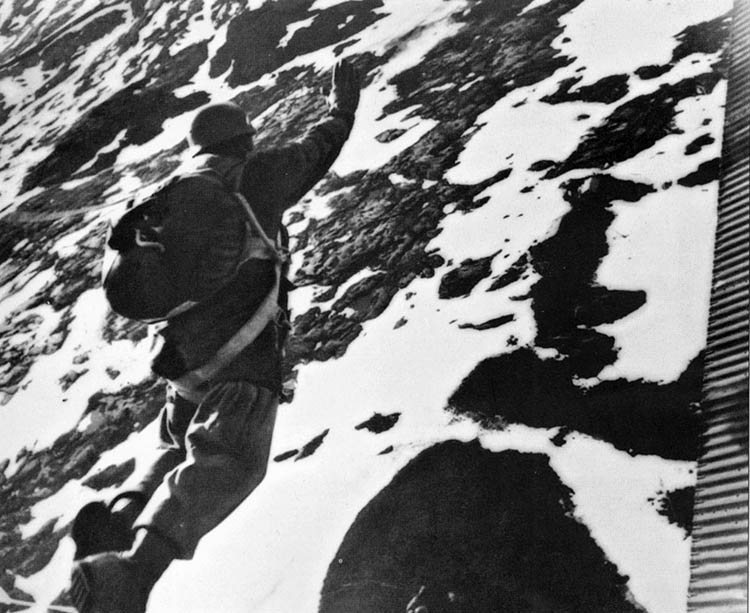 Indicative of the low altitude at which German air- borne troops jumped into combat, this photo was taken from a Ju-52 transport aircraft on April 9, 1940.
 