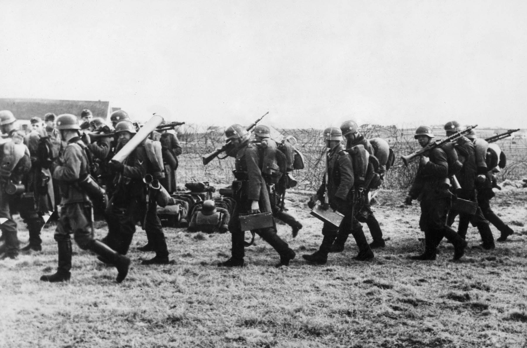 Photographed on April 15, 1940, German soldiers march toward their assigned positions after landing at the military airport of Stavanger.