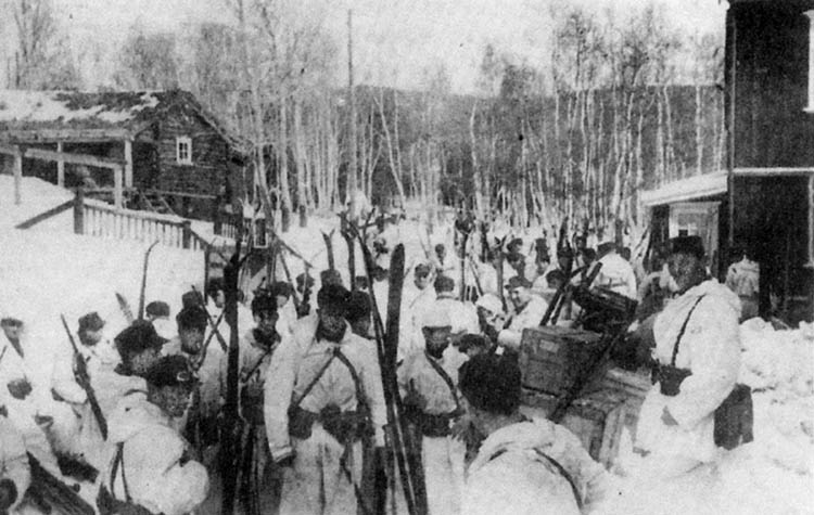 German paratroopers, some mounting bicycles, quickly assemble in their drop zones near the Norwe- gian town of Dombås in central Norway.