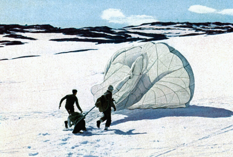 German airborne troops, known as Fallschirmjäger, retrieve their parachutes after landing in Norway north of the capital city of Oslo in April 1940.