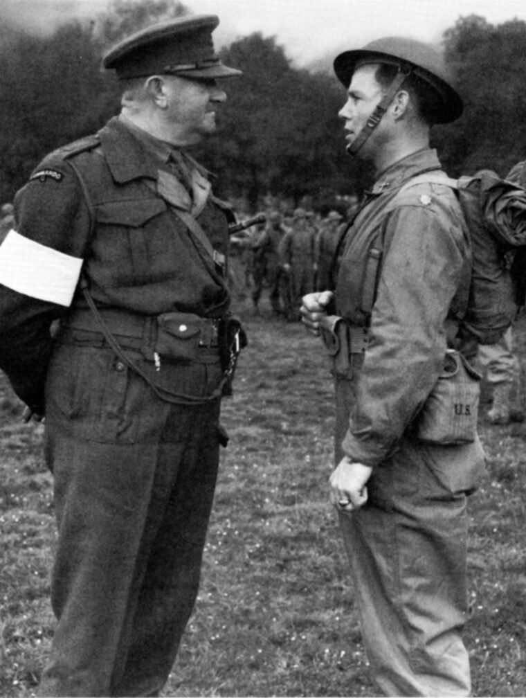 Lieutenant Colonel Charles Vaughn, head of British Commando training, converses with Major William Darby of the U.S. Rangers in July 1942. 