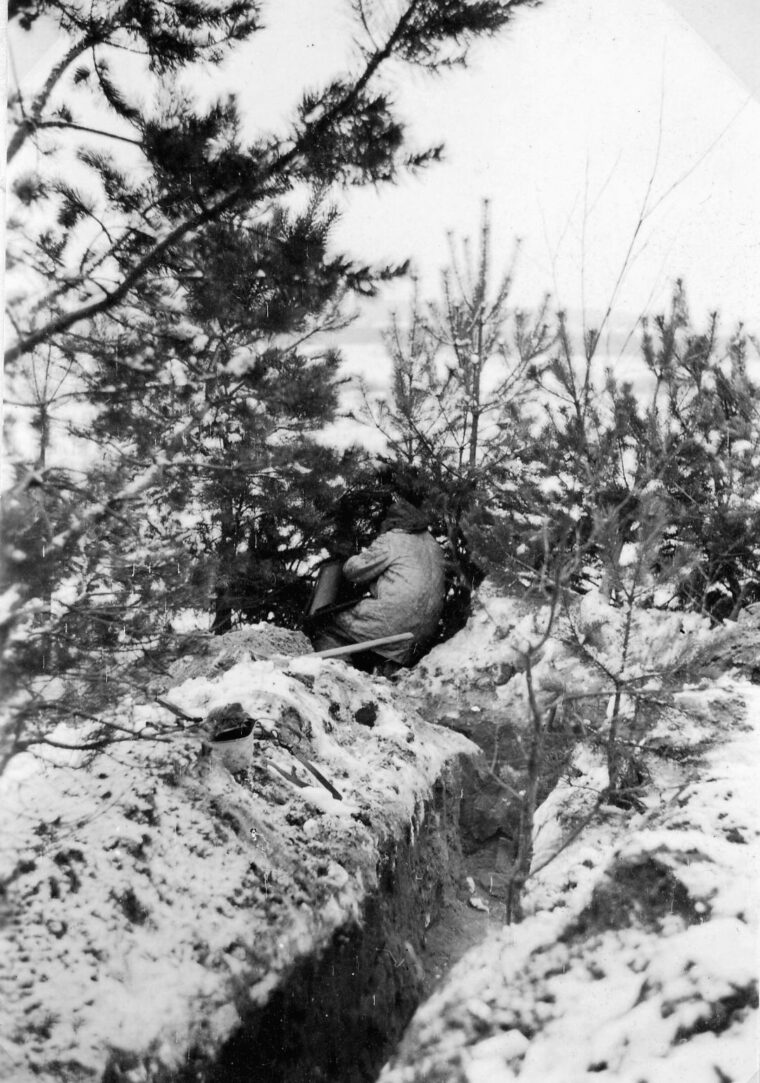 Hans-Joachim Buchmüller, a comrade of Joachim Benz, scans the horizon near Vitebsk during the winter of 1943-44. The bitter cold took a fearful toll among the German troops and caused mechanized equipment to fail. 