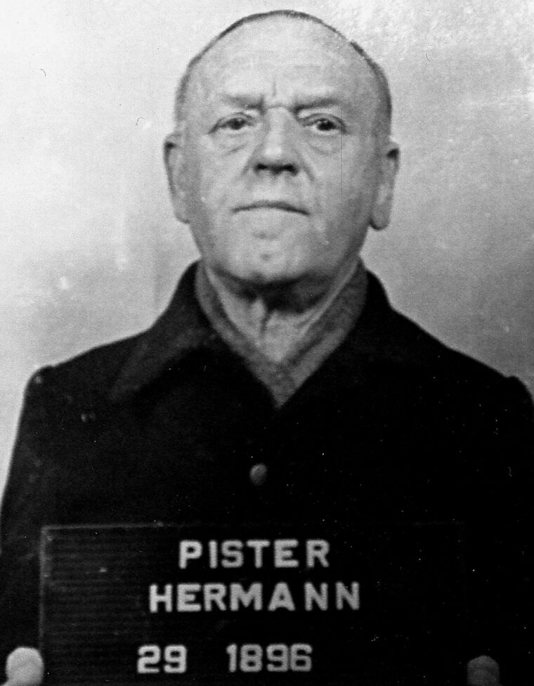 An expressionless Hermann Pister, the second and final commandant of Buchenwald, was photographed by American military police following his capture.
