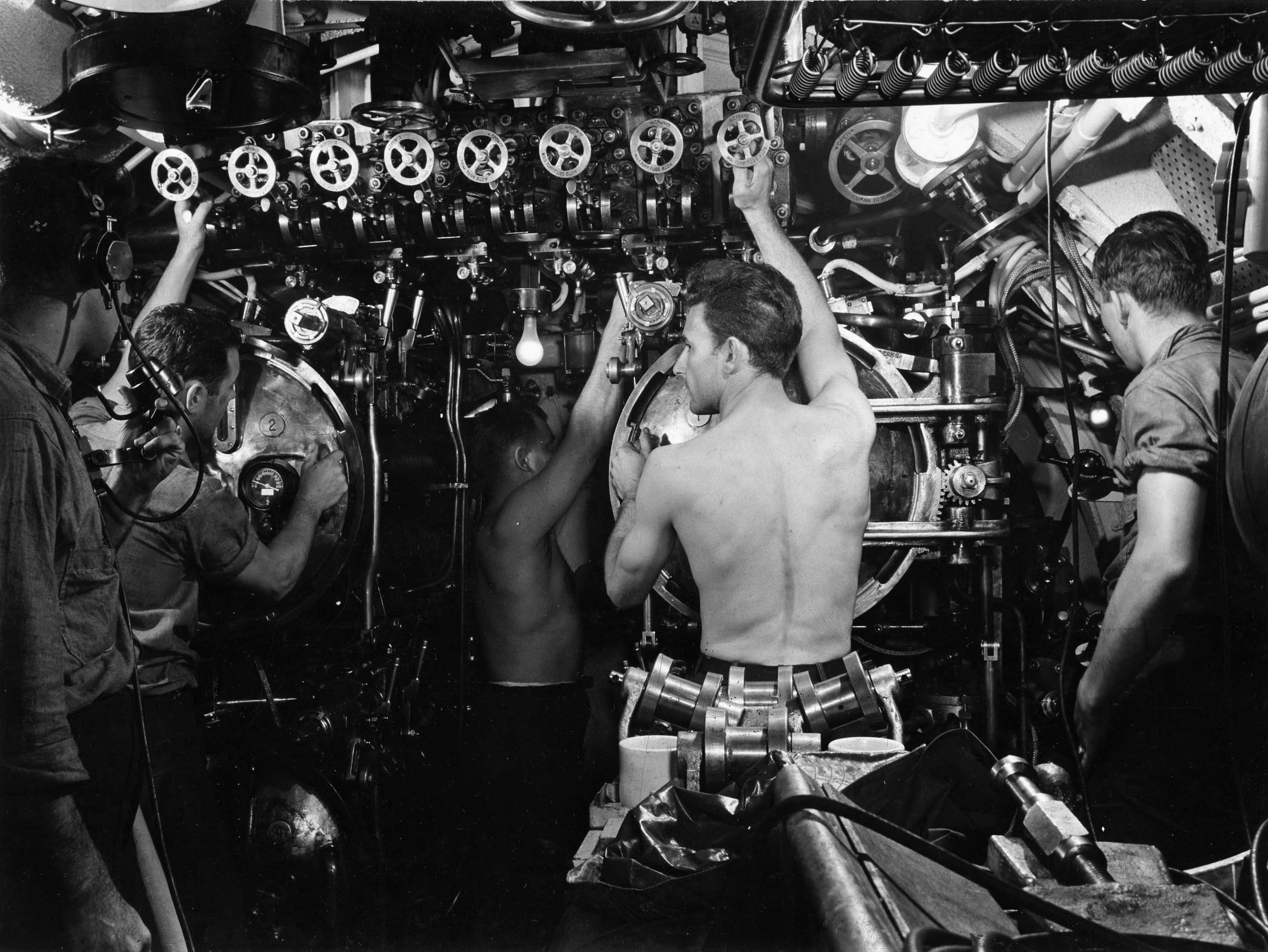 The cramped quarters of a U.S. submarine may be seen in this view of the torpedo room aboard the USS Cero. Submarine duty was among the most hazardous in World War II.