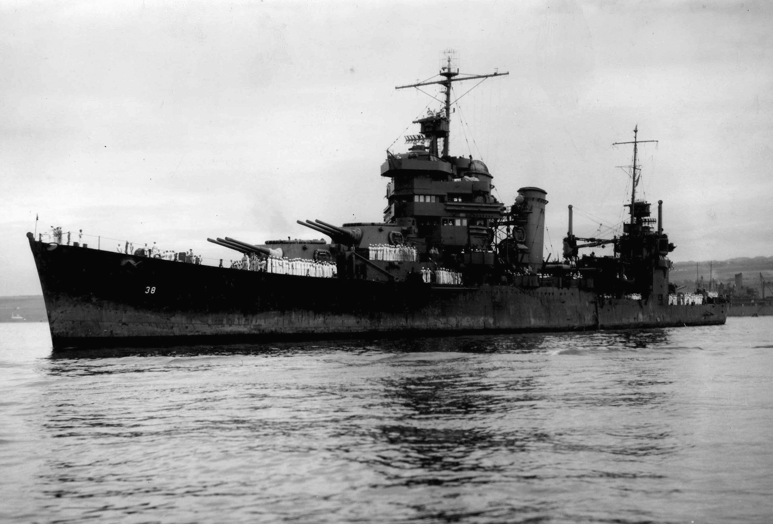 Damaged during the savage naval battles around the island of Guadalcanal, the cruiser USS San Francisco arrives at Pearl Harbor to undergo repairs.