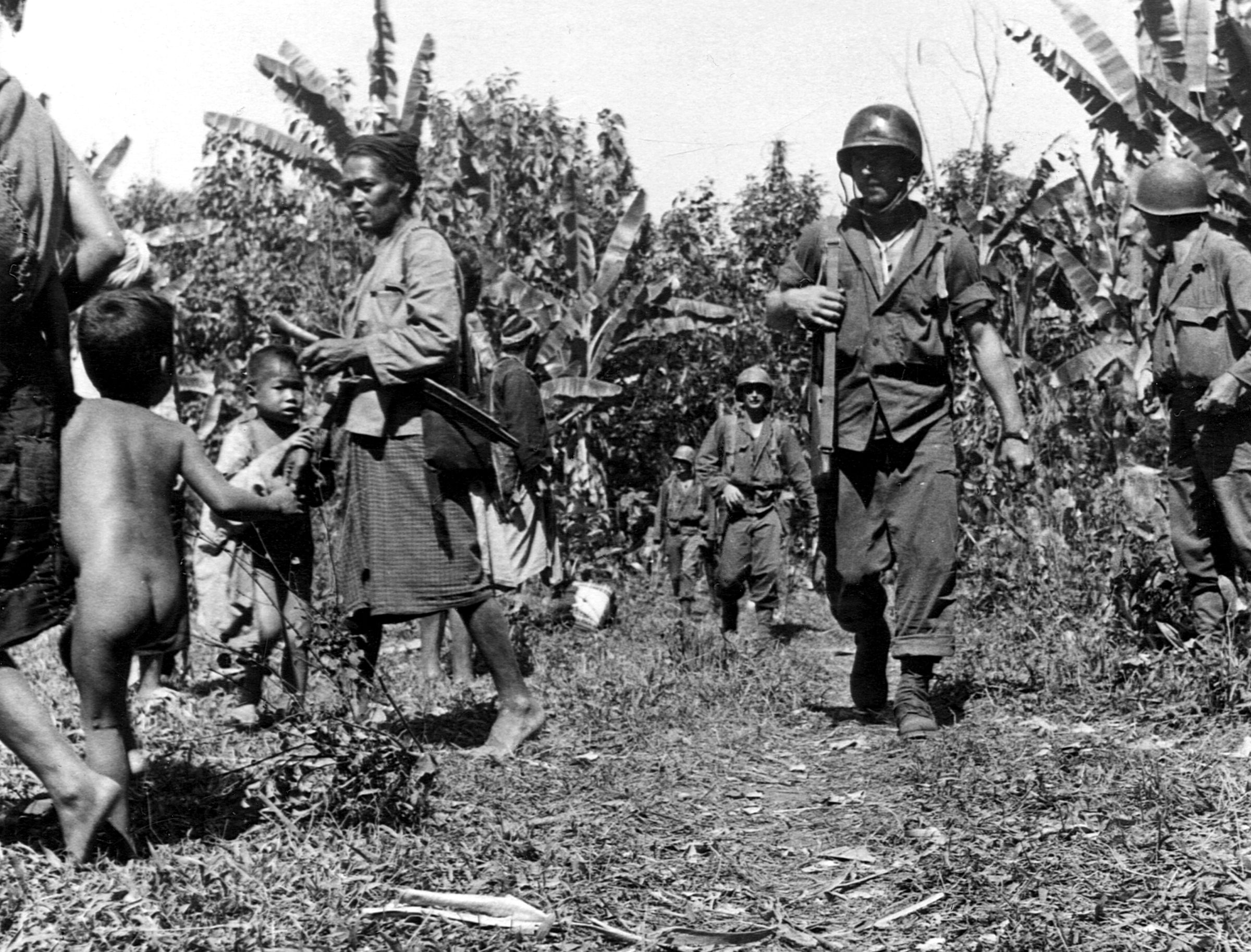 Passing through a Burmese village in March 1944, a group of Merrill’s Marauders emerge from the thick jungle. Along with the Japanese, disease and harsh climactic conditions often proved to be destructive foes.