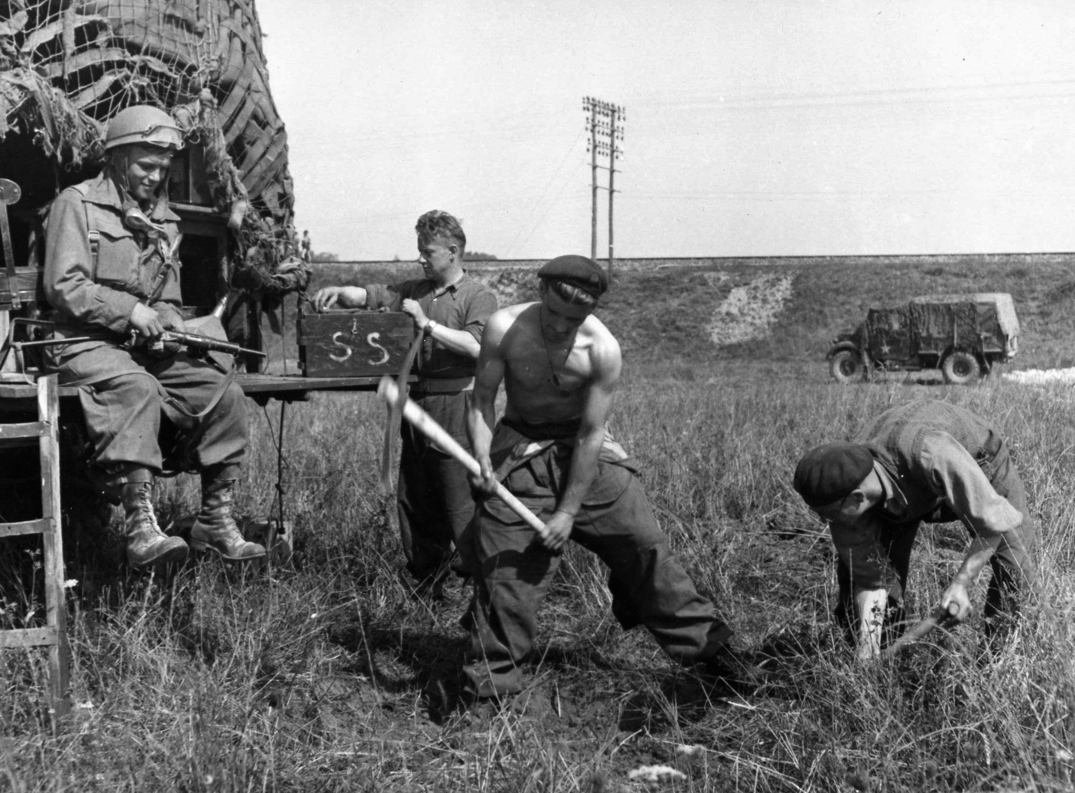 Digging in to hold their position somewhere in Normandy, some of these Polish soldiers have stripped to the waist in the summer heat. The Poles fought tenaciously during the closing of the Falaise Gap. (All photos: National Archives)