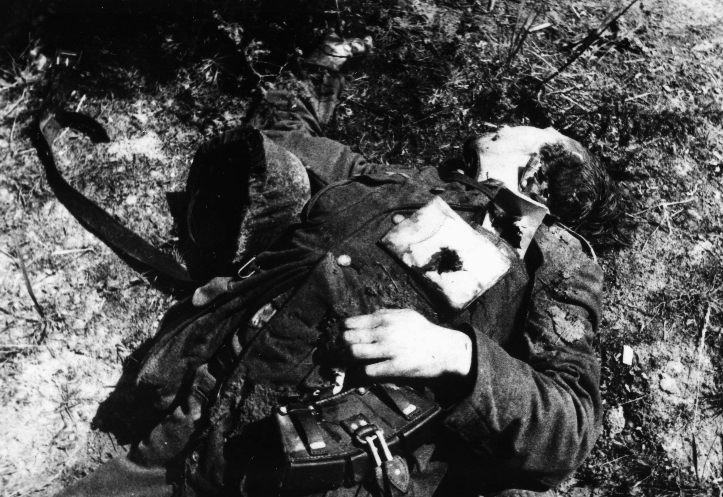 A dead German soldier lies where he fell. Tenacious Soviet defense at Tikhvin held the Germans in check before Leningrad. 