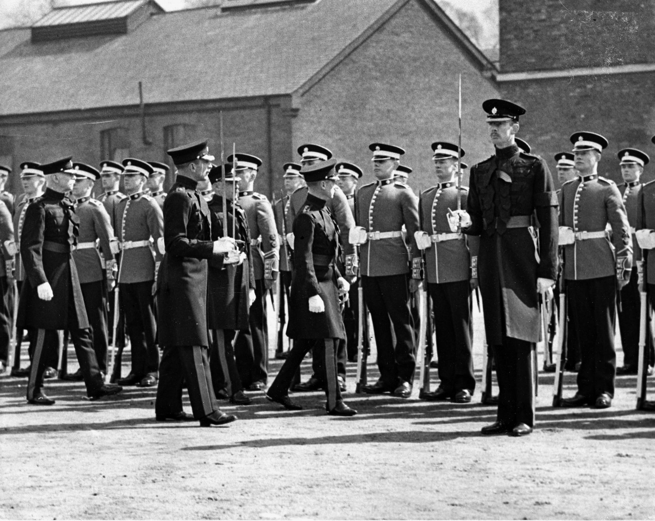 During his short reign, King Edward VIII inspects troops of the 1st Battalion, Coldstream Guards, at Victoria Barracks in Windsor on April 24, 1936.