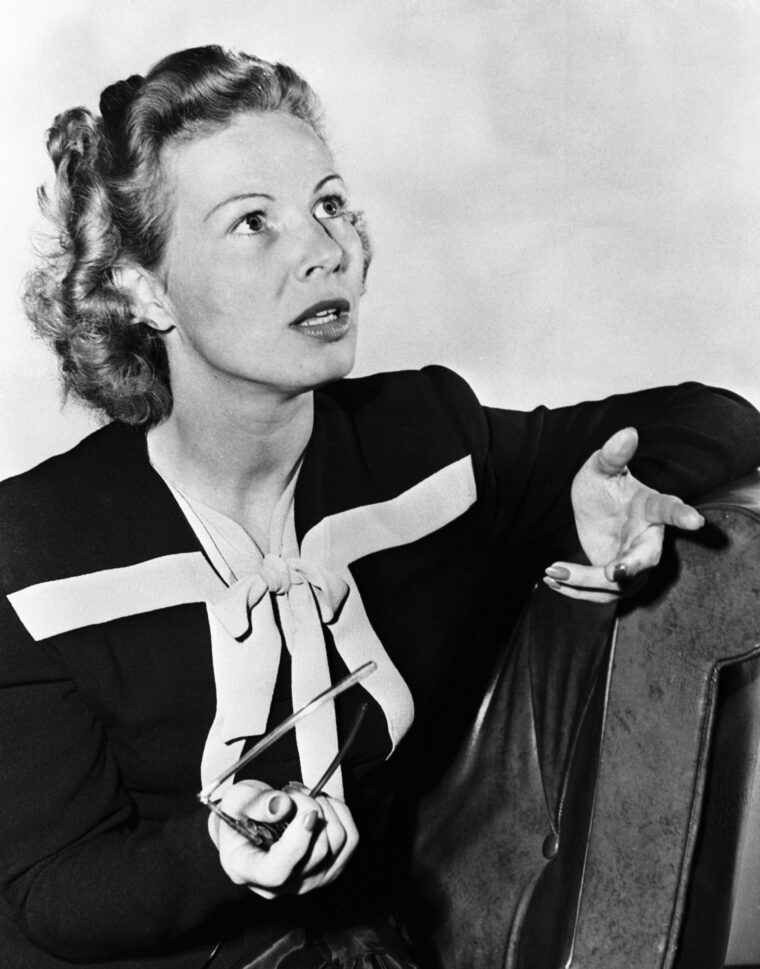 Inga Arvad addresses a question from a reporter in Los Angeles on July 9, 1945.