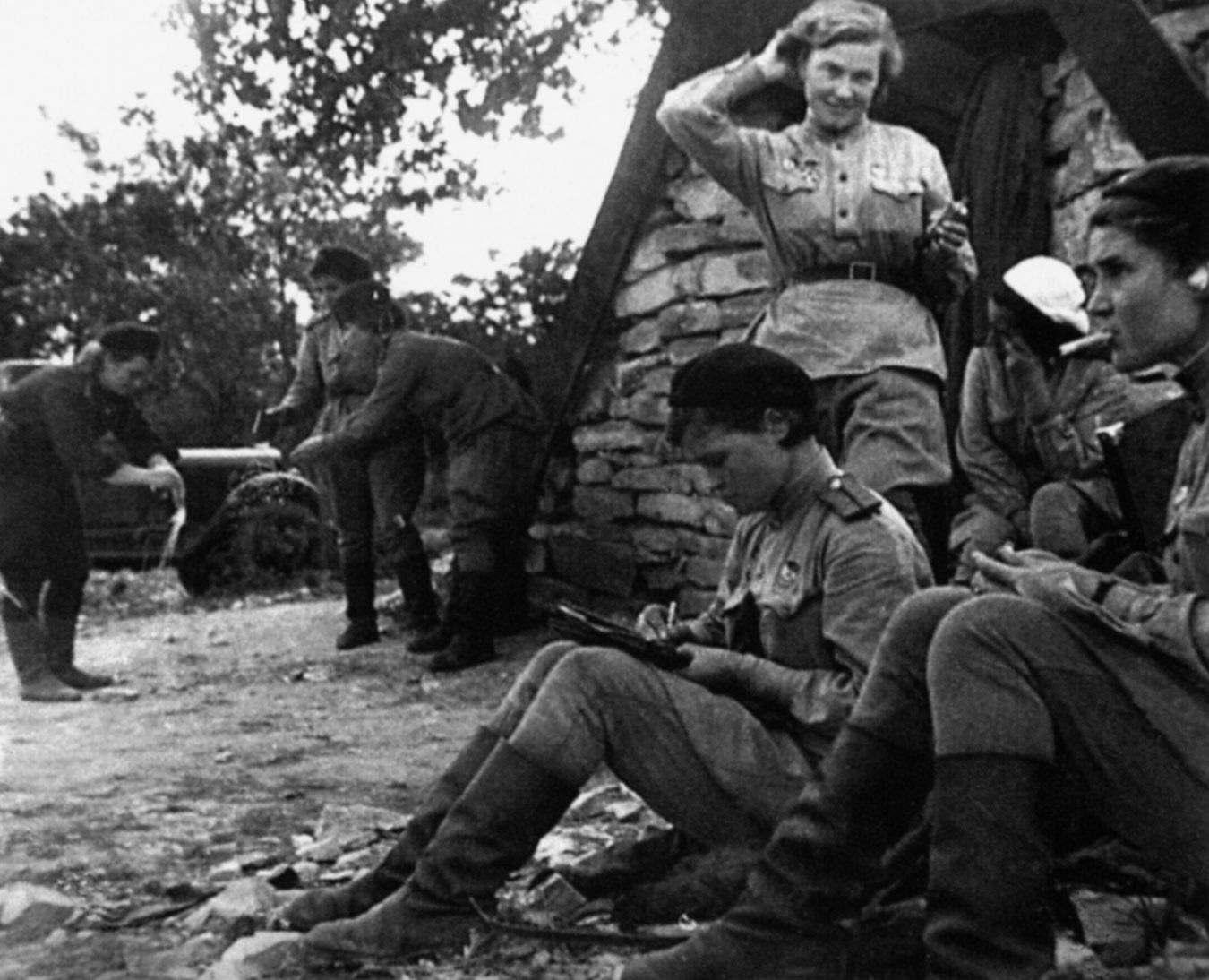 Pilots of Pe-2 bombers with the 125th Guards Day Bomber Regiment relax between missions as they await orders to take to the air once again. Several Night Witches received prestigious Soviet military decorations for their service.